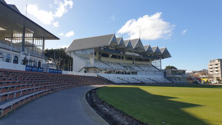 Inside the Basin Reserve cricket pitch, looking towards the two historic grandstands.